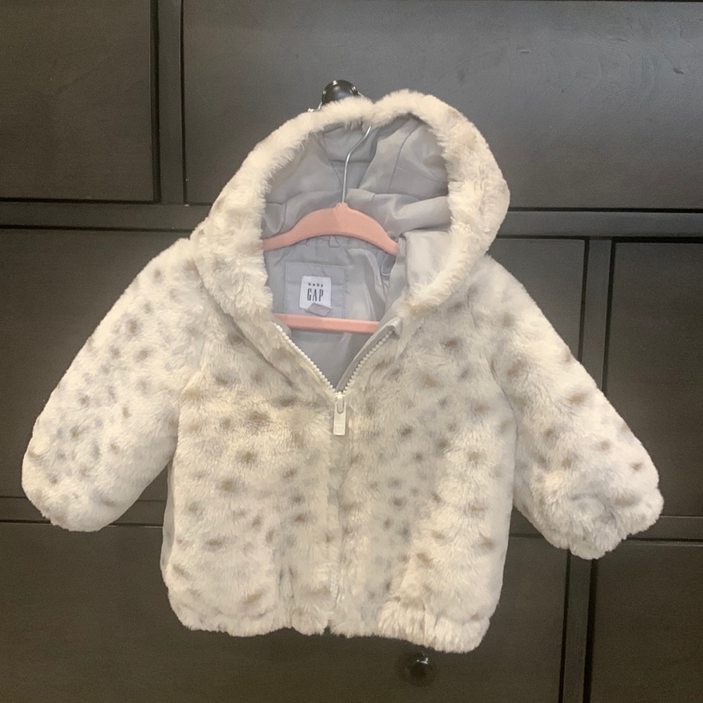 Excellent uses condition Gap faux fur coat. 0-6 month